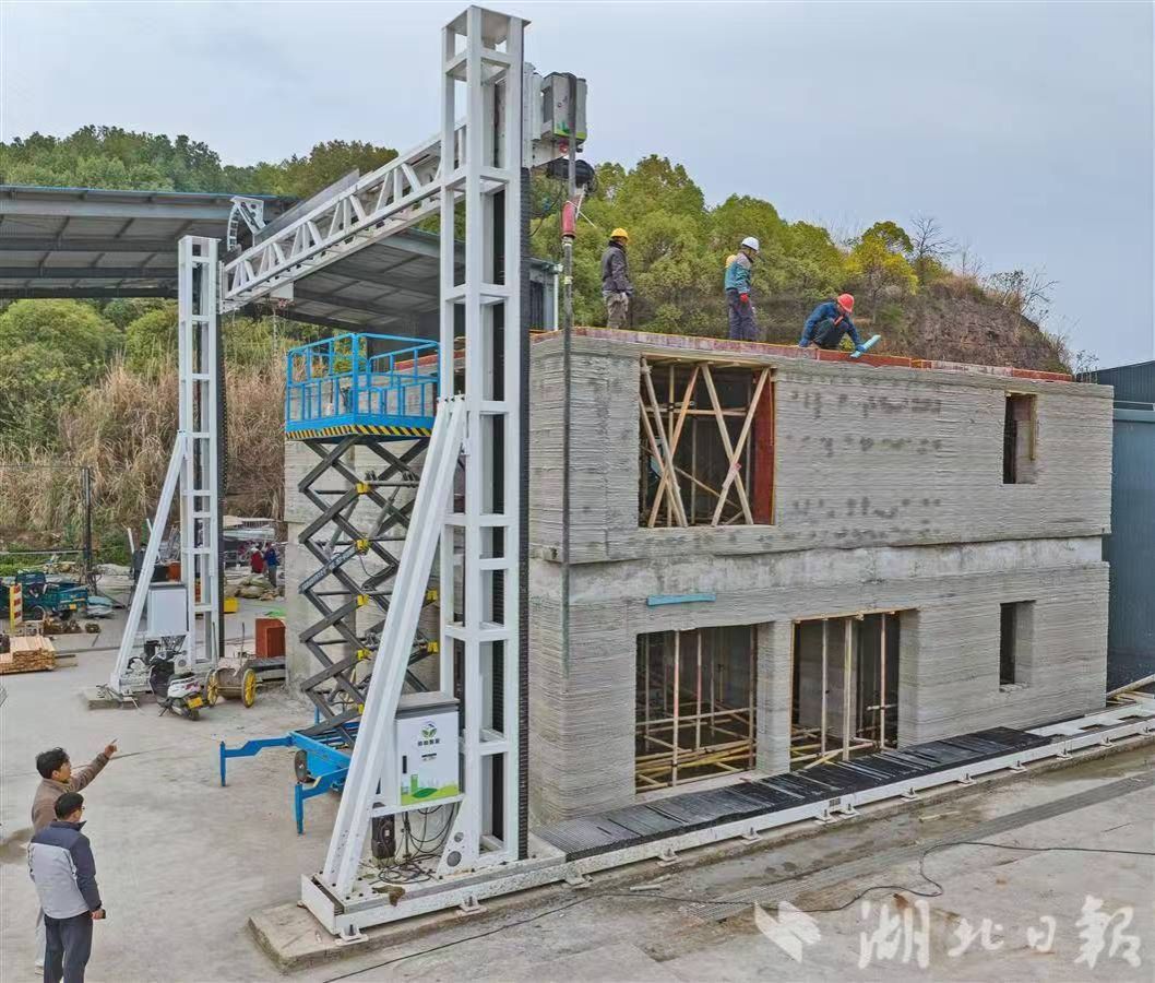 【湖北日报】beat365官方网站“打印”出双层小楼-1027-媒体关注